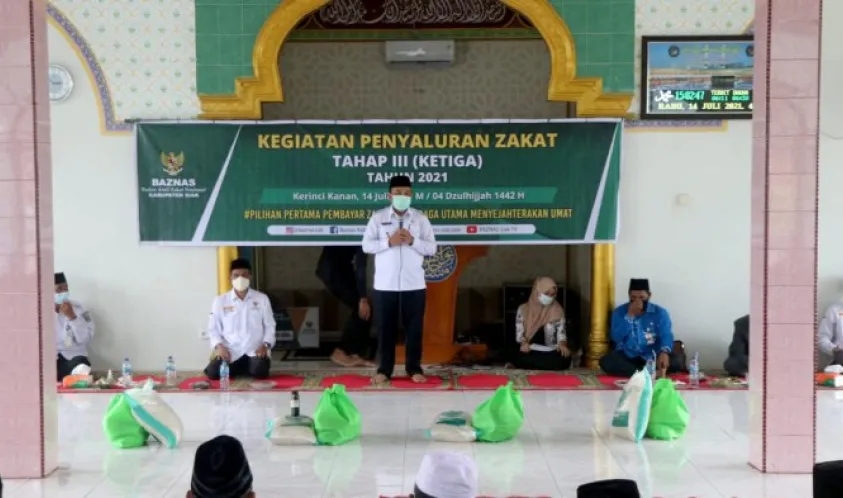 Wabup Husni Merza Hadiri Acara Pendistrbusian Zakat Tahap III di Kampung Buatan Baru Kerinci Kanan